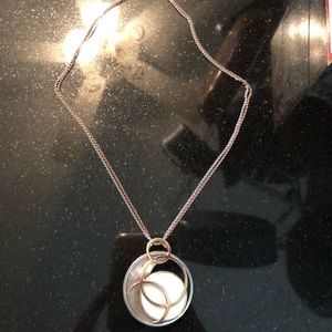 Super pretty silver and rose gold necklace.